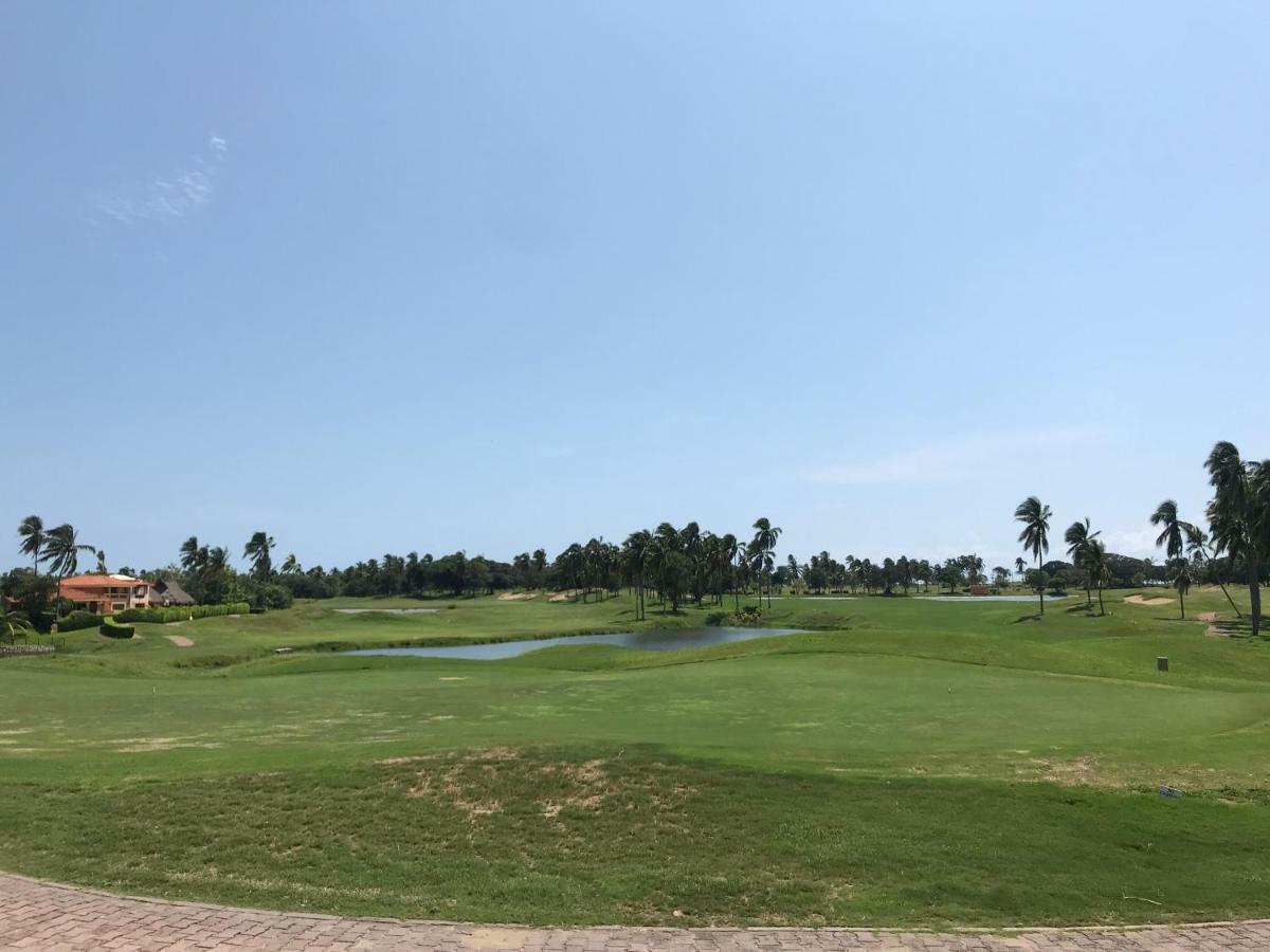 Grand Isla Navidad Golf & Spa Resort With Marina Барра-де-Навидад Экстерьер фото Golf course in Punta Cana